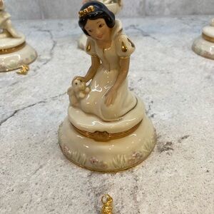 Snow White and the Seven Dwarfs Lenox Figurine Set with charms.